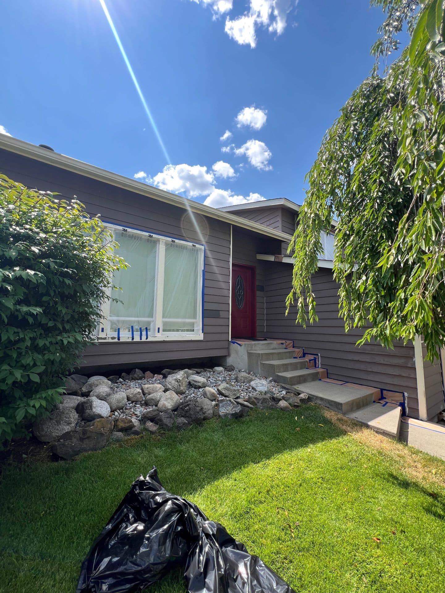 Gallery photos for Stunning Exterior Transformation with Dark Gray Finish: Image #1