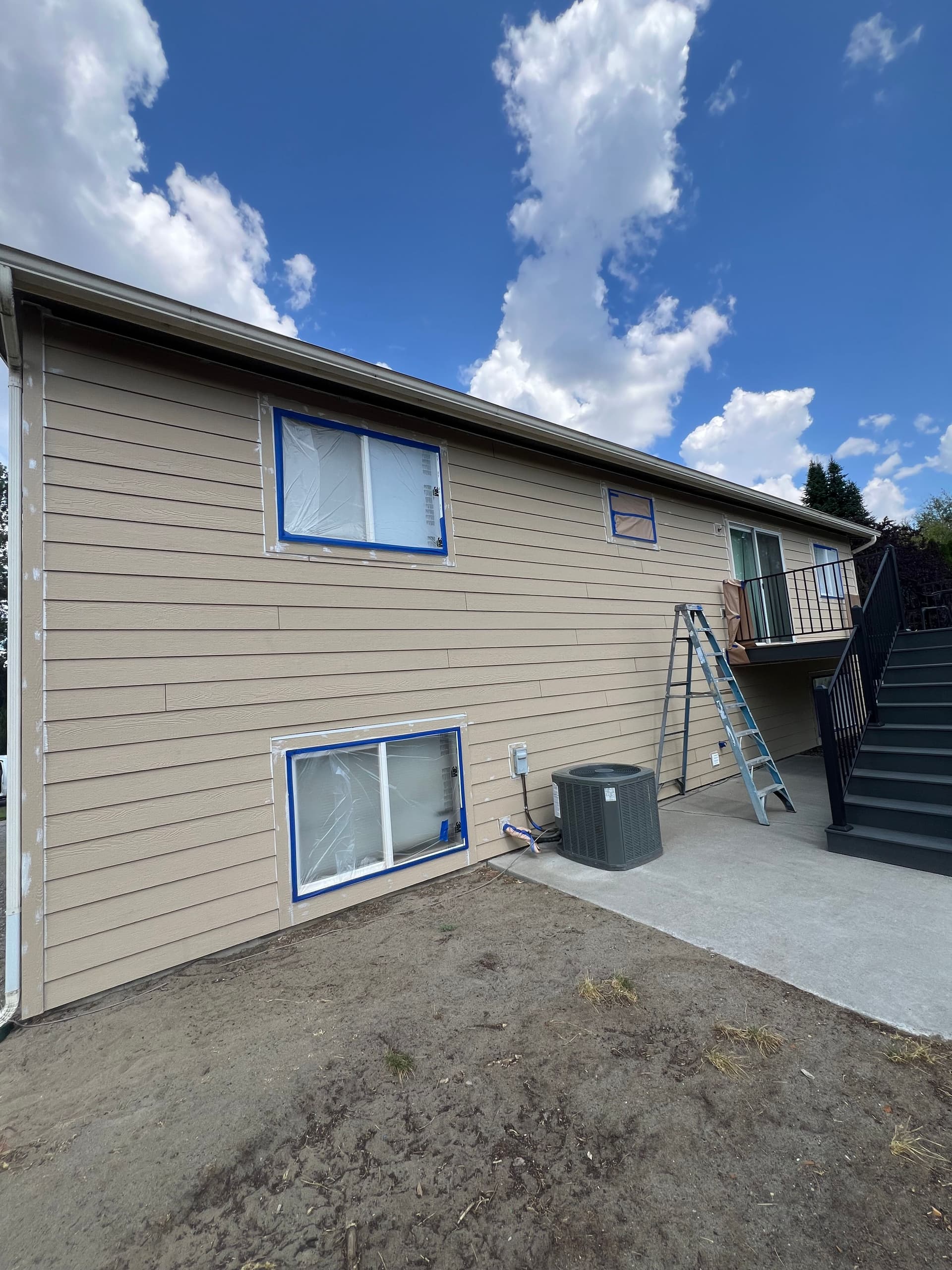 Gallery photos for Stunning Exterior Transformation with Dark Gray Finish: Image #4